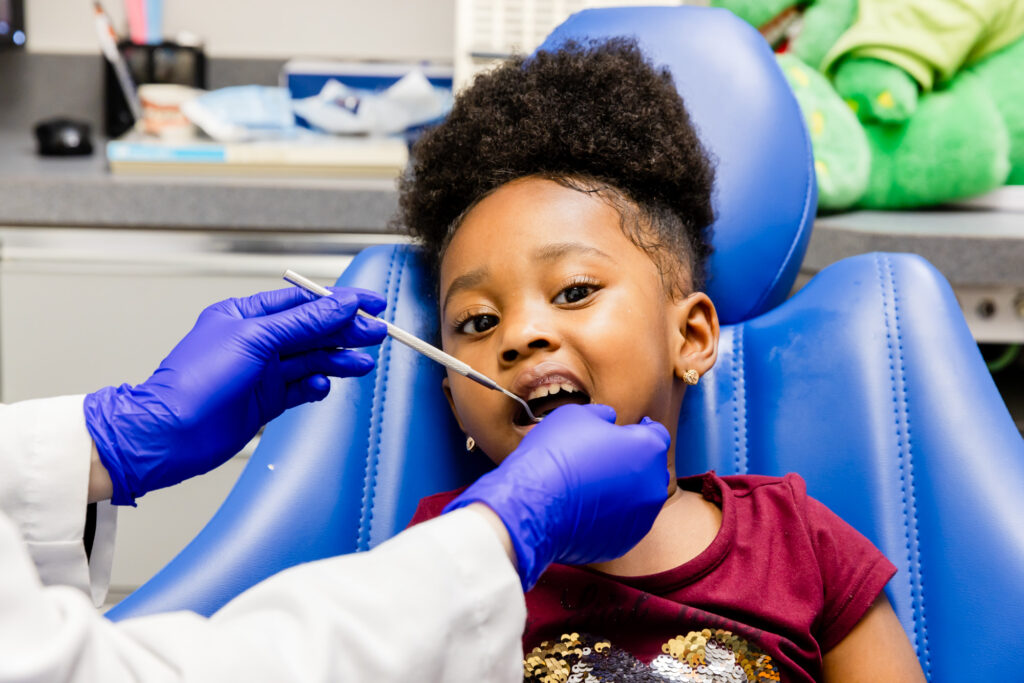 Young patient during her visit to our emergency pediatric dentistry in Gainesville.